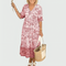 Constance | Robe midi fleurie à bordure imprimée et ourlet à volants