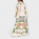 Lisa - Robe longue élégante à imprimé floral et coupe fluide