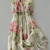 Lucía | Robe vintage à lacets et imprimé fleuri