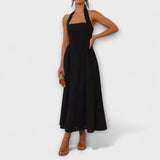 Lydia - Robe mi-longue noire à col halter et détail taille