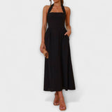 Lydia - Robe mi-longue noire à col halter et détail taille