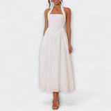 Lydia - Robe mi-longue noire à col halter et détail taille