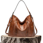 Maëlle Paula | Sac en cuir à franges