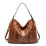 Maëlle Paula | Sac en cuir à franges