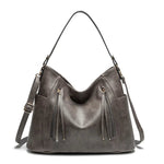 Maëlle Paula | Sac en cuir à franges