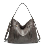 Maëlle Paula | Sac en cuir à franges