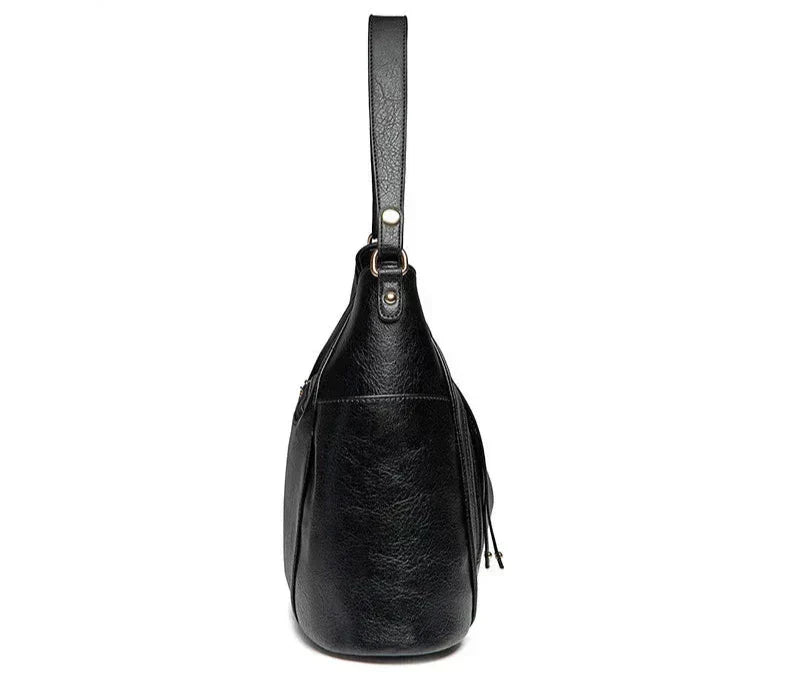 Maëlle Paula | Sac en cuir à franges