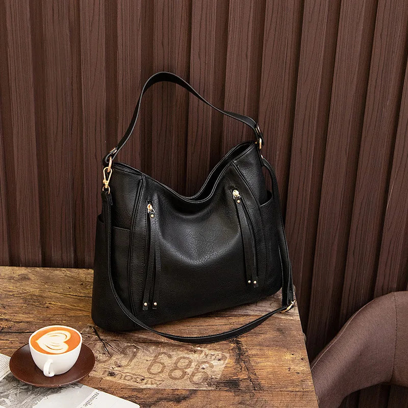 Maëlle Paula | Sac en cuir à franges