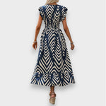 Milena | Robe à imprimé intégral et taille smockée