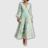 Odelia – Robe midi fleurie à la silhouette fluide