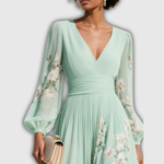 Odelia – Robe midi fleurie à la silhouette fluide