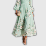 Odelia – Robe midi fleurie à la silhouette fluide