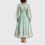 Odelia – Robe midi fleurie à la silhouette fluide