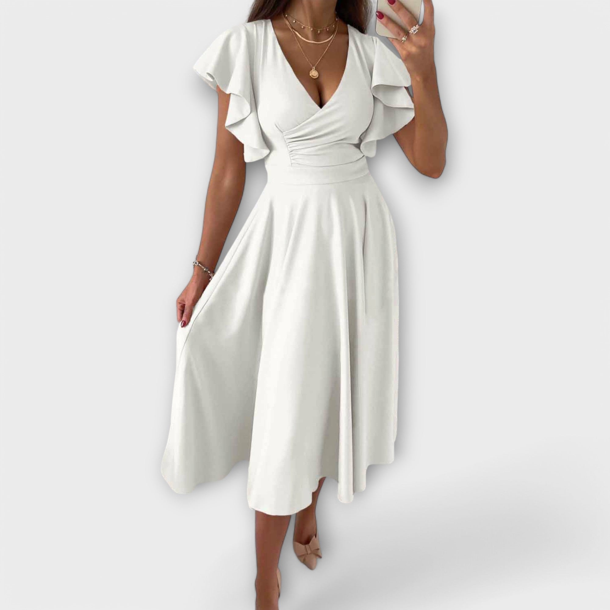 Robe élégante à col en V et silhouette fluide