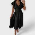 Robe élégante à col en V et silhouette fluide