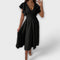 Robe élégante à col en V et silhouette fluide