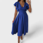 Robe élégante à col en V et silhouette fluide